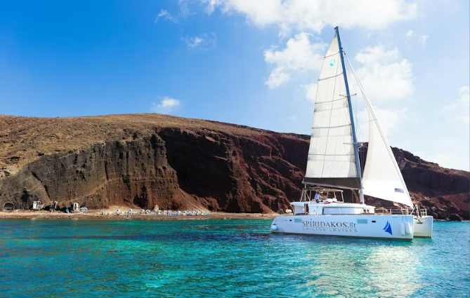 Santorini Luxury Catamaran Cruise with Pickup, BBQ and Cocktails - Image 2